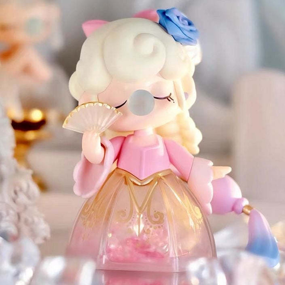 Nanci Museum of Fantasy: Museum of Fantasy figure wearing a pink dress and holding a fan