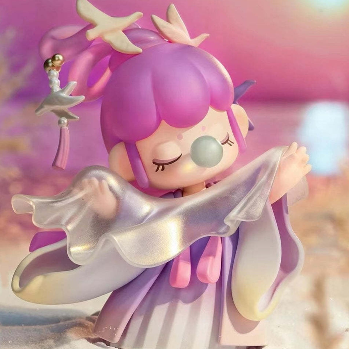 Nanci Poetic Beauty: Purple-haired Nanci figure with a crescent motif