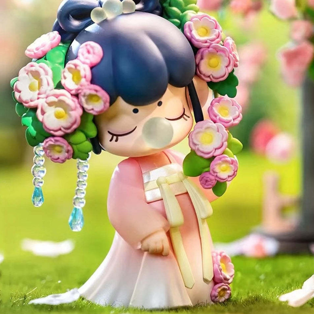 Nanci Poetic Beauty: Purple-haired Nanci figure with pink floral styling