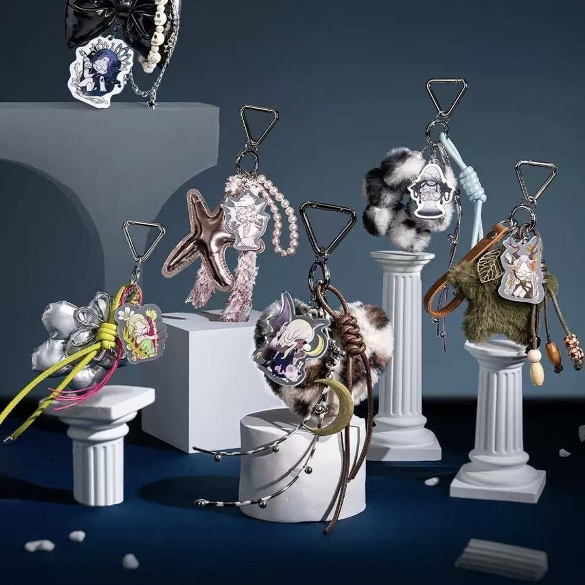 Nanci Secret Fantasy Plush Pendants: Secret Fantasy pendant design group displayed on pedestals; series reference