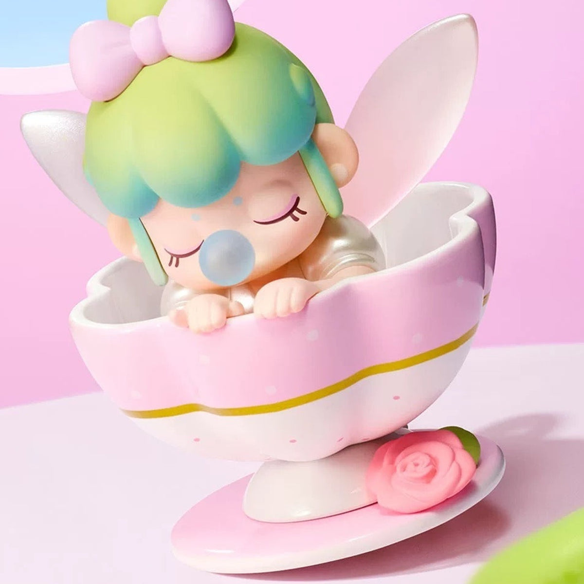Nanci Sweet Time: Green-haired Nanci figure sitting in a teacup