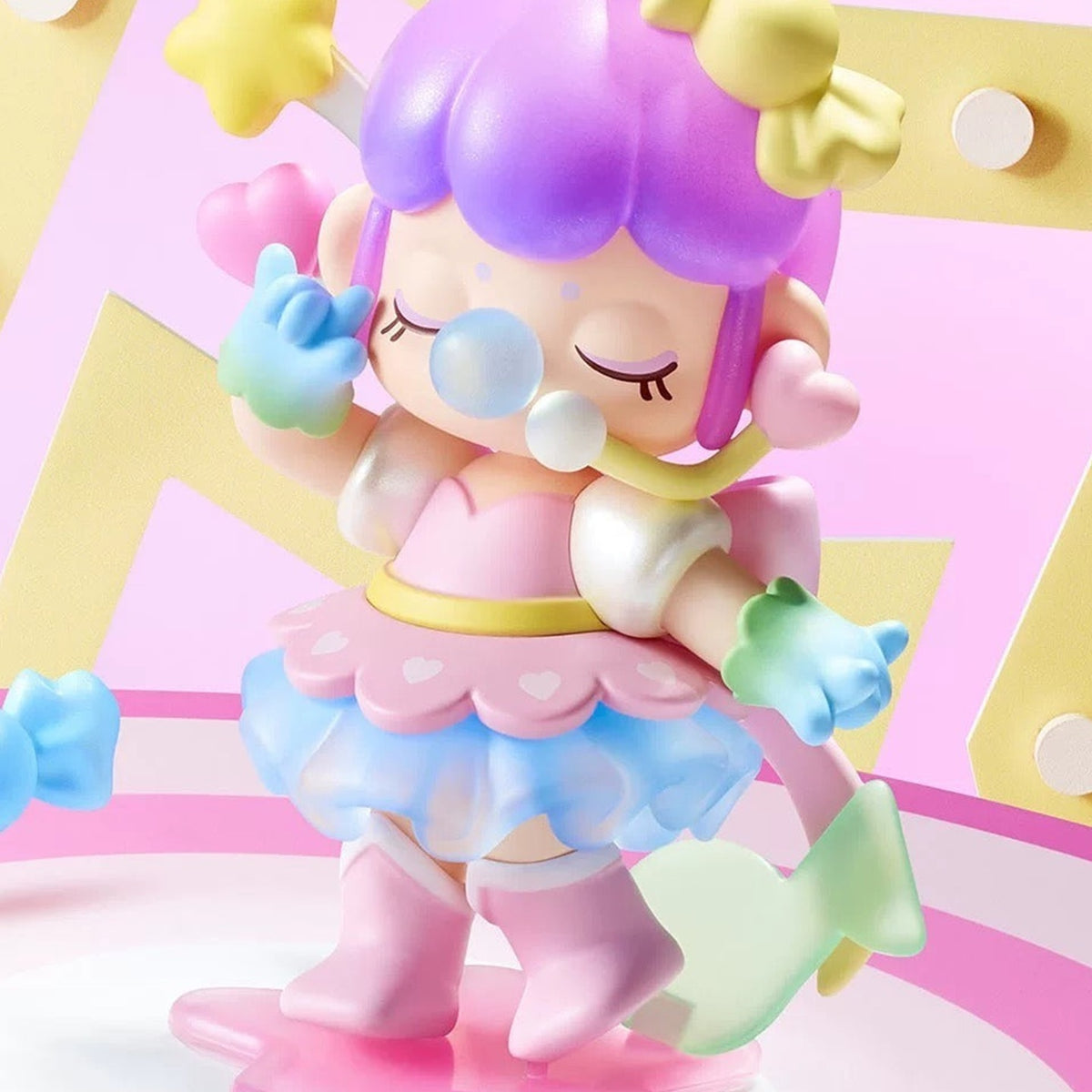 Nanci Sweet Time: Purple-haired Nanci figure in a colourful candy outfit