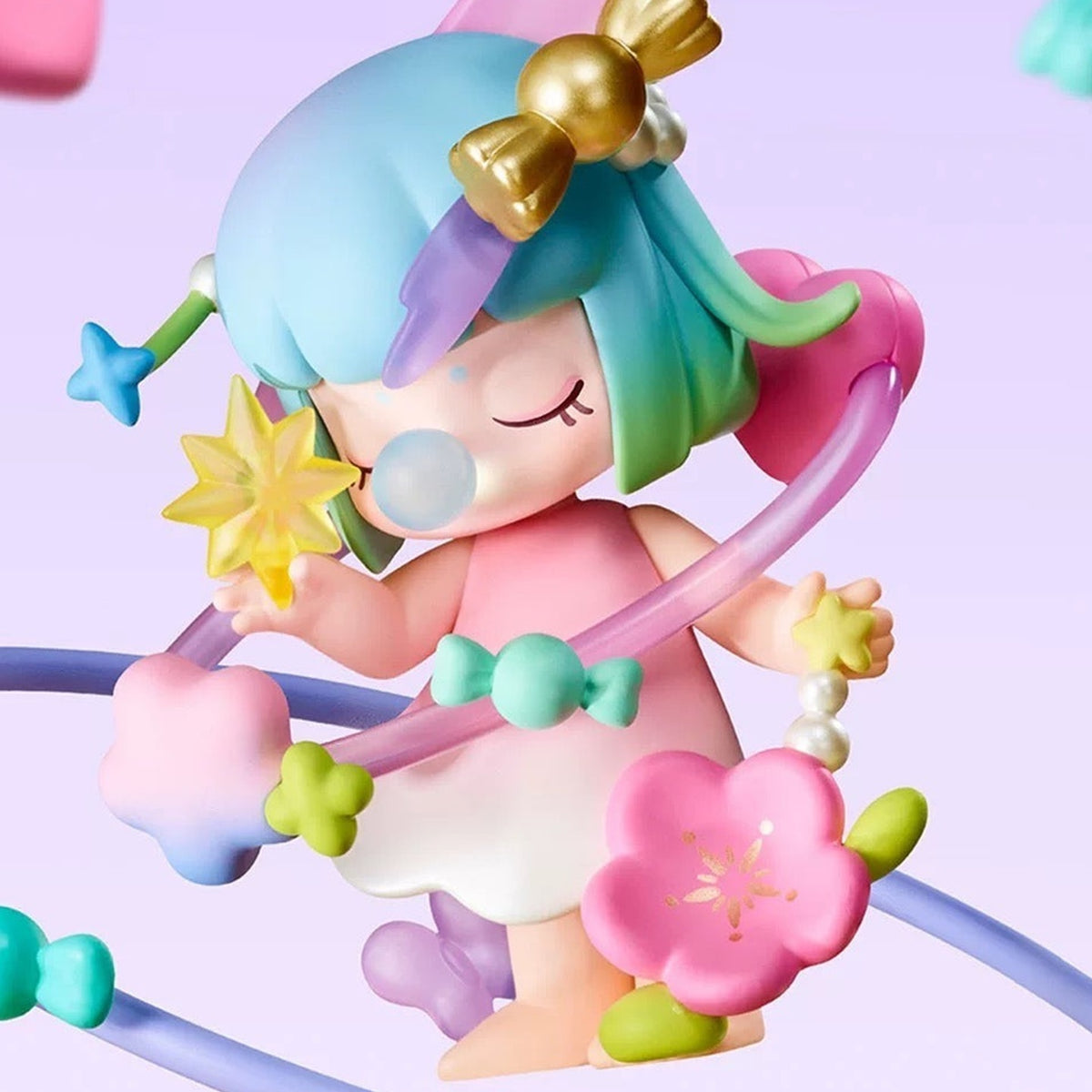 Nanci Sweet Time: Teal-haired Nanci figure with a candy planet motif