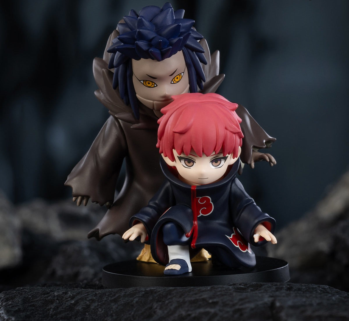 Naruto Shippuden Battle Against Akatsuki blind box series - Sasori design example with puppet display against a dark background