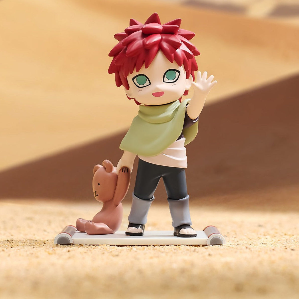 Naruto Shippuden Childhood blind box series - Gaara childhood design example beside a teddy bear