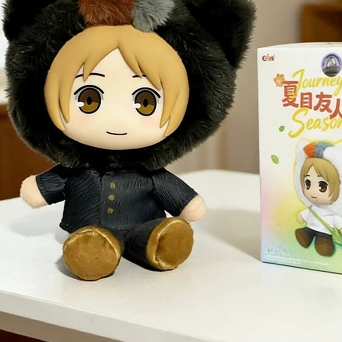 Natsume's Book of Friends Journey Of Seasons Series Plush Pendant Blind Box - Complete seated black-hooded plush pendant example; random design not guaranteed