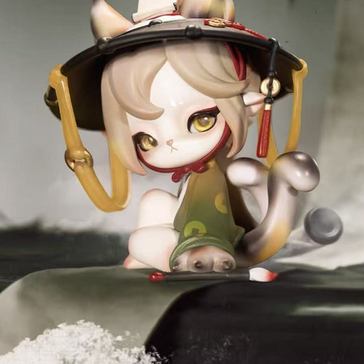 Ninimo Whispering Seasons Series Figure Blind Box - Pale-haired figure in dark hat with gold-colored side ornaments; upper hat and ears cropped; random design not guaranteed; display props not included