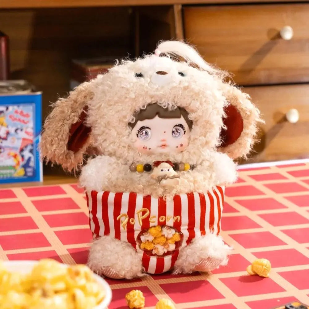 NOMMI About the Childhood — PUPPY POPCORN confirmed plush design, front view; display scenery not included