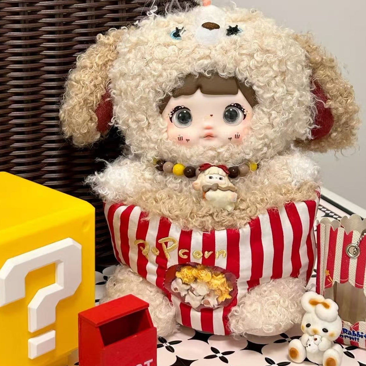 NOMMI About the Childhood — Puppy Popcorn confirmed design front view