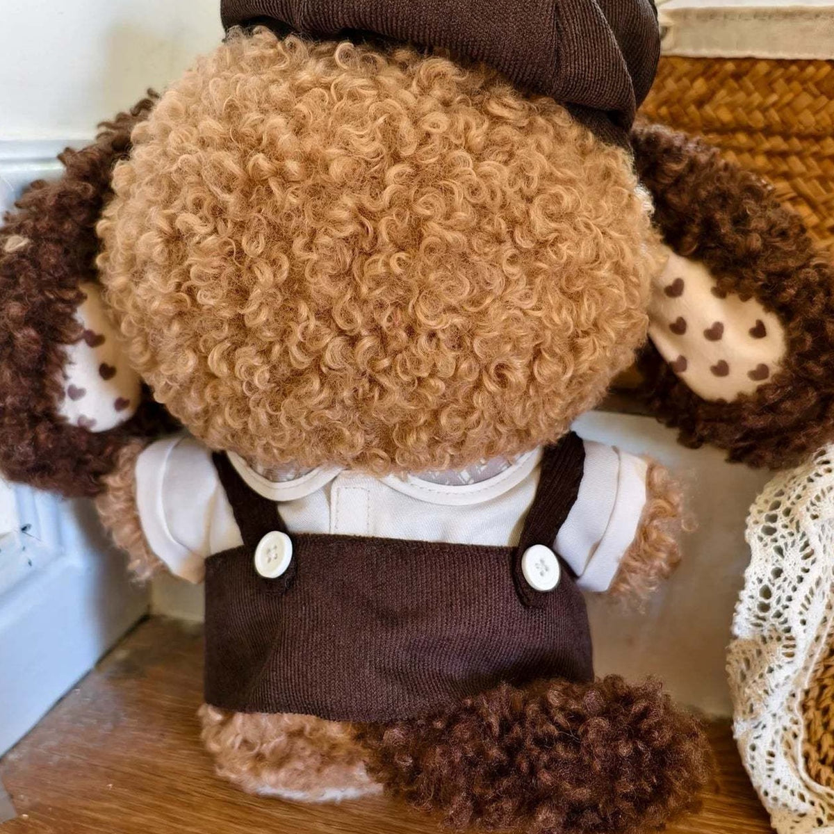 Nommi Chocolate Puppy 400% Plush Doll, Limited Edition - Chocolate Puppy rear outfit detail; upper hat cropped; display props not included