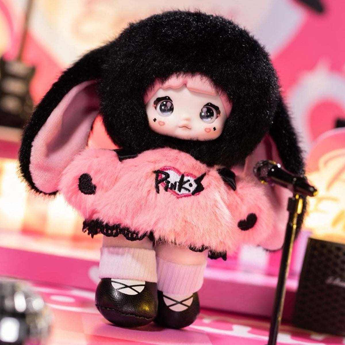 Nommi Pink Energy Series Plush Pendant Blind Box - Complete black hooded plush pendant example; display props not included; random design not guaranteed