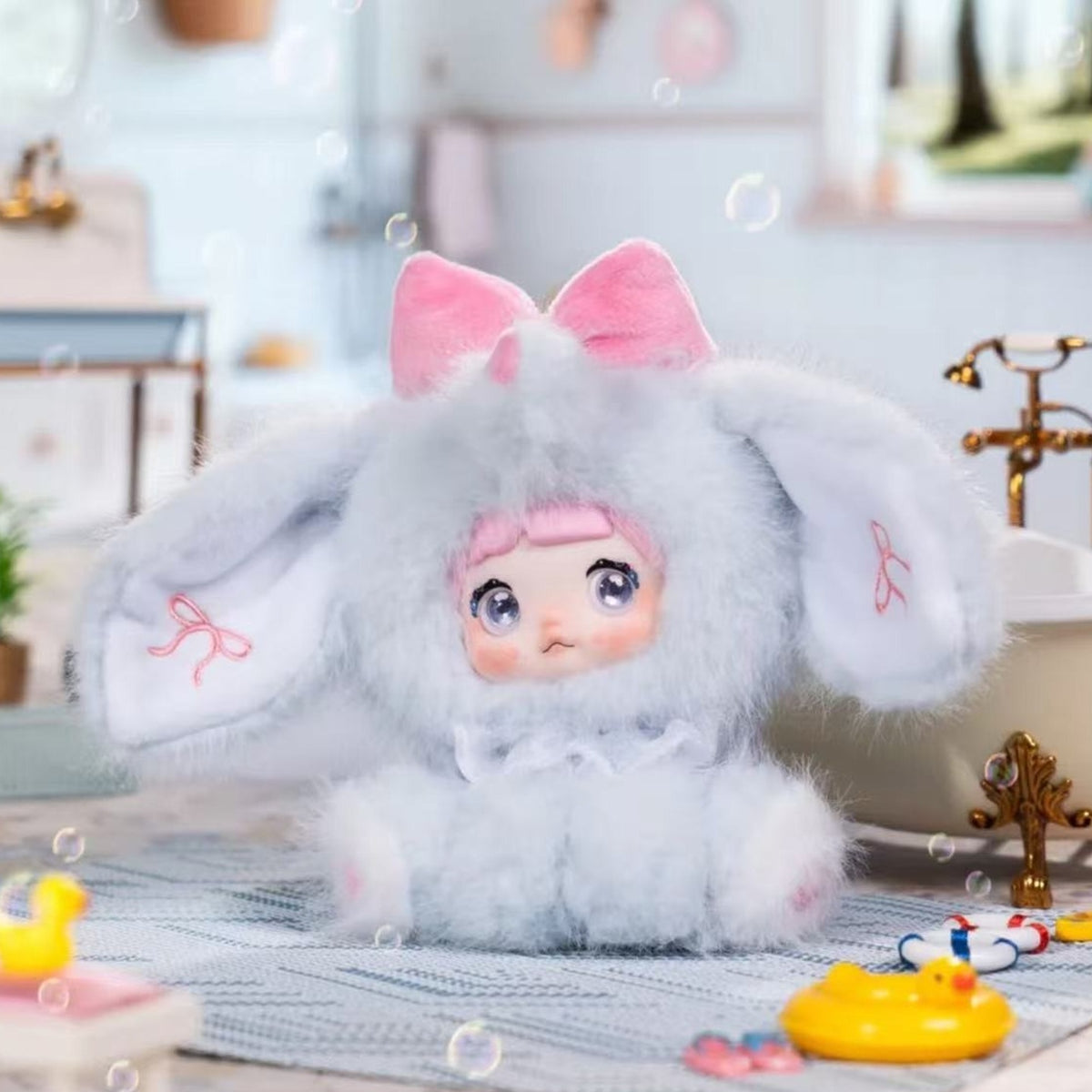 Nommi Sitting Zoo Series Vinyl Plush Doll Keychain Blind Box - Complete gray elephant-hood seated plush example; random design not guaranteed