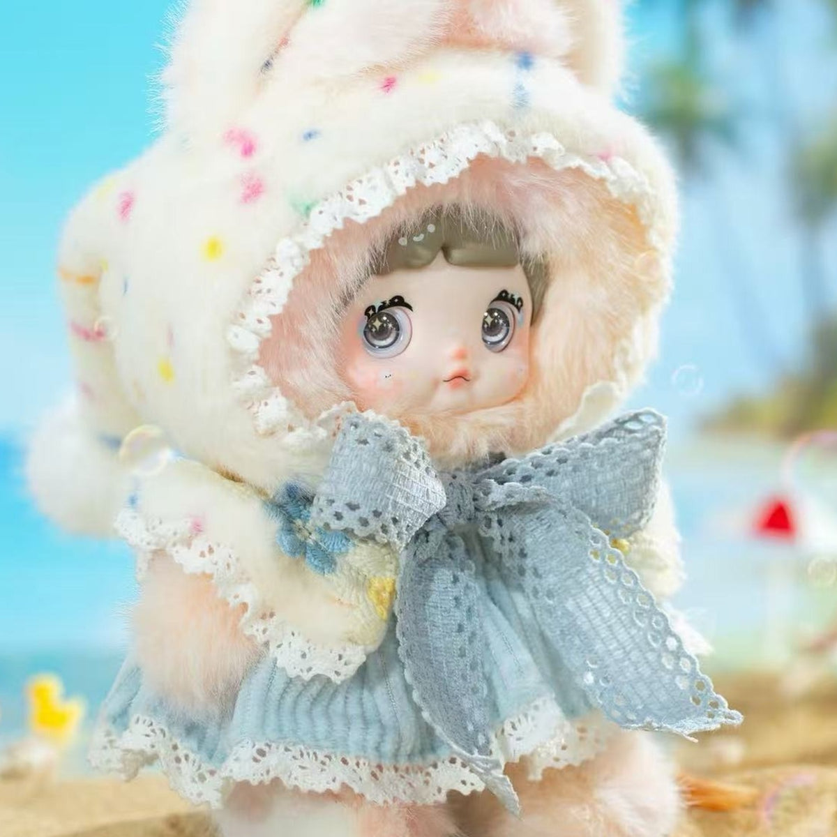 NOMMI Weather Forecast — Sunshine confirmed design, blue outfit and bonnet front view