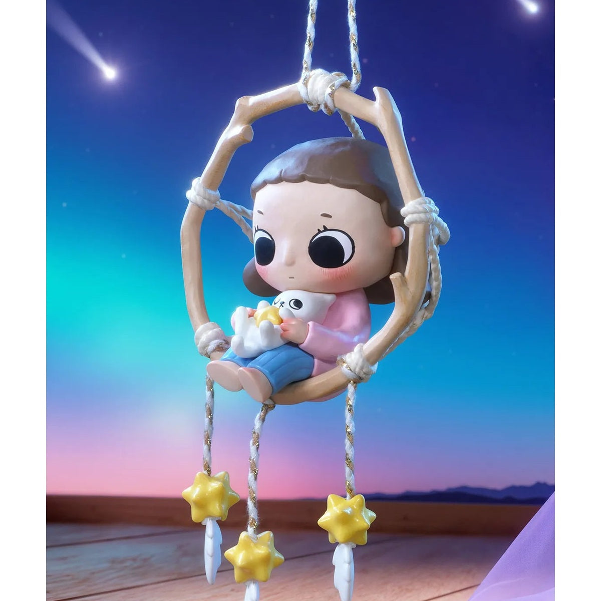 Nyota We Are All Stars blind box series - Dreamcatcher Star secret design example seated in a hanging hoop; secret not guaranteed