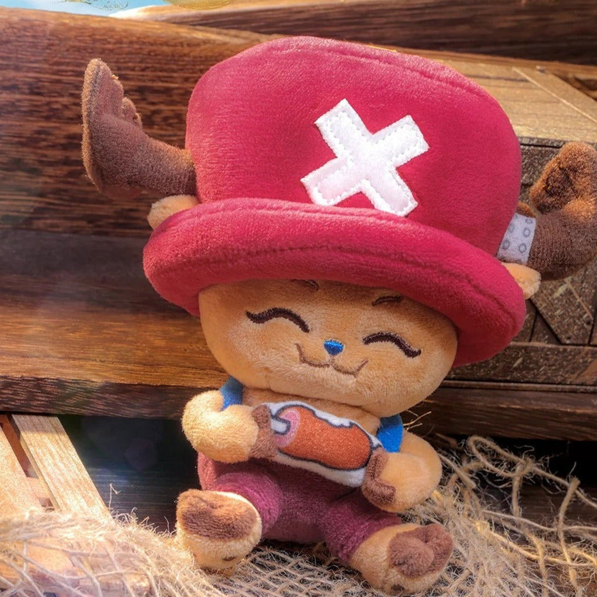 One Piece Chopper Series Plush Keychain Blind Box - Complete laughing Chopper plush example holding meat; random design not guaranteed