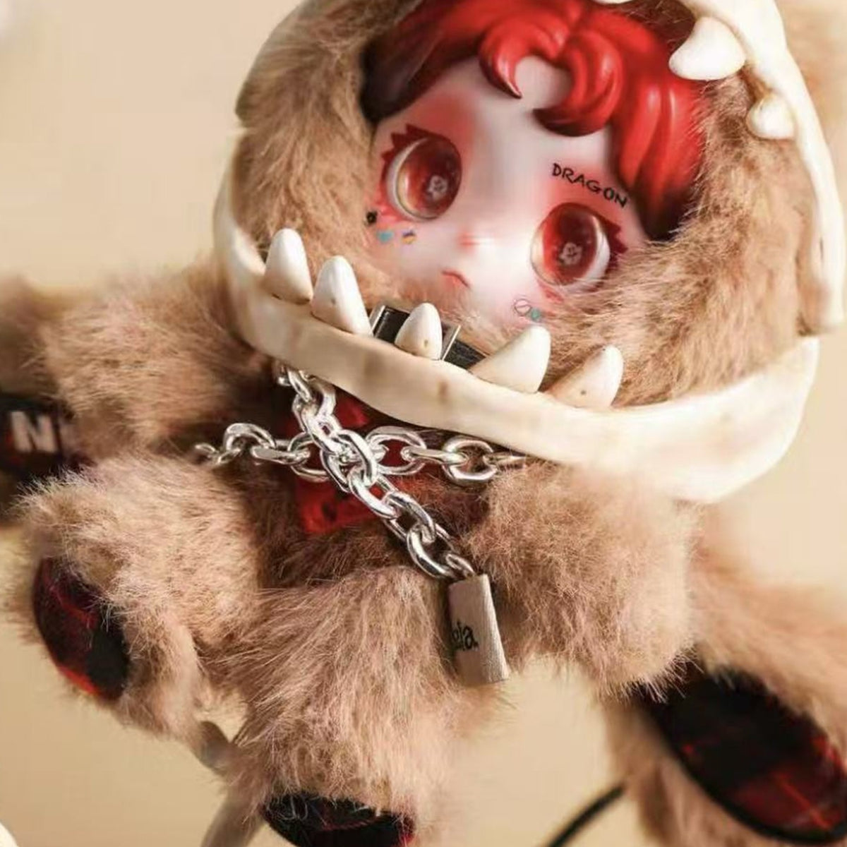 Ossia Soft Edges Series Plush Doll Blind Box - Ossia brown dinosaur-costume plush doll detail with upper hood cropped; random design not guaranteed