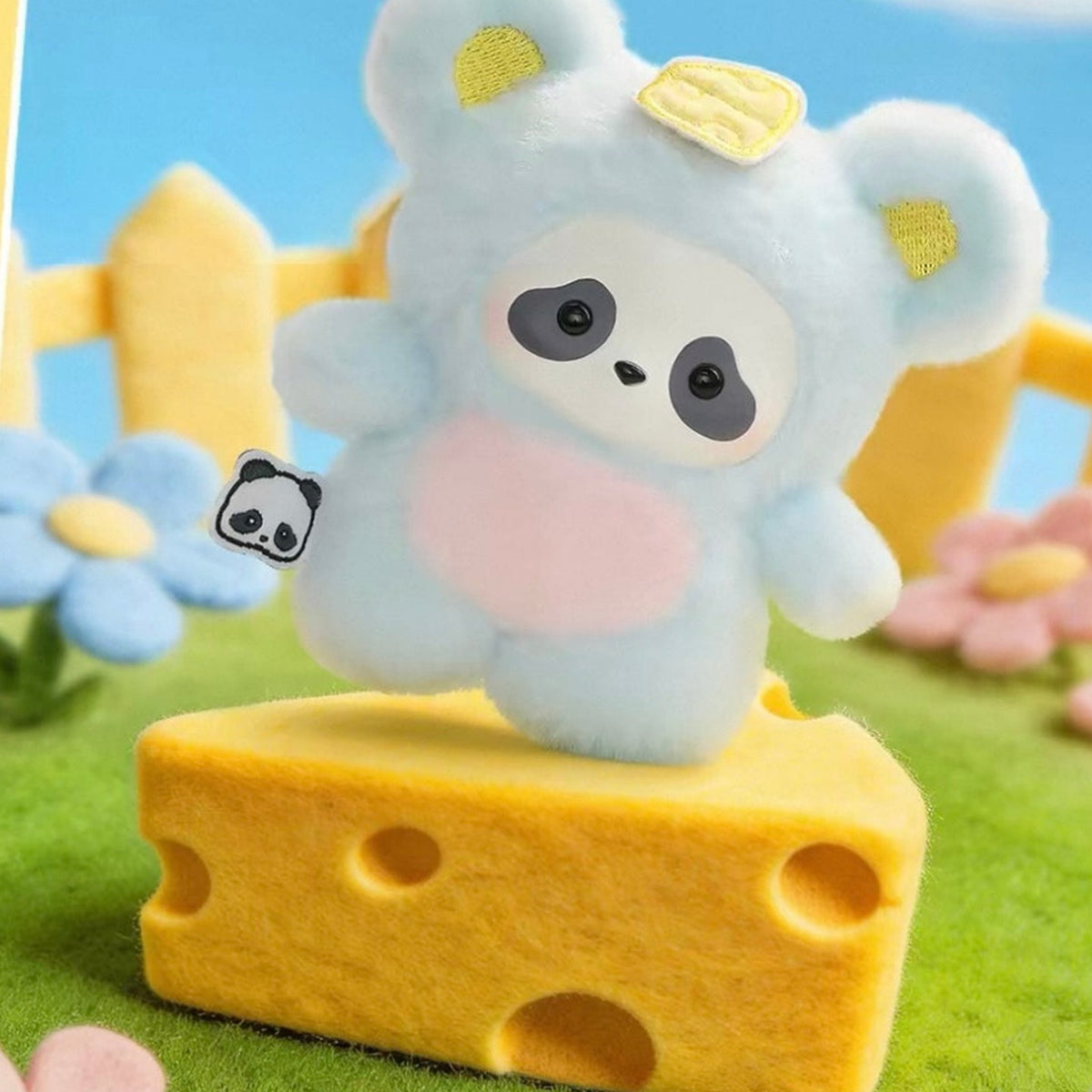 Panda Roll The Zoo In Hands Series Plush Pendant Blind Box - Blue plush pendant detail with upper ear cropped; random design not guaranteed