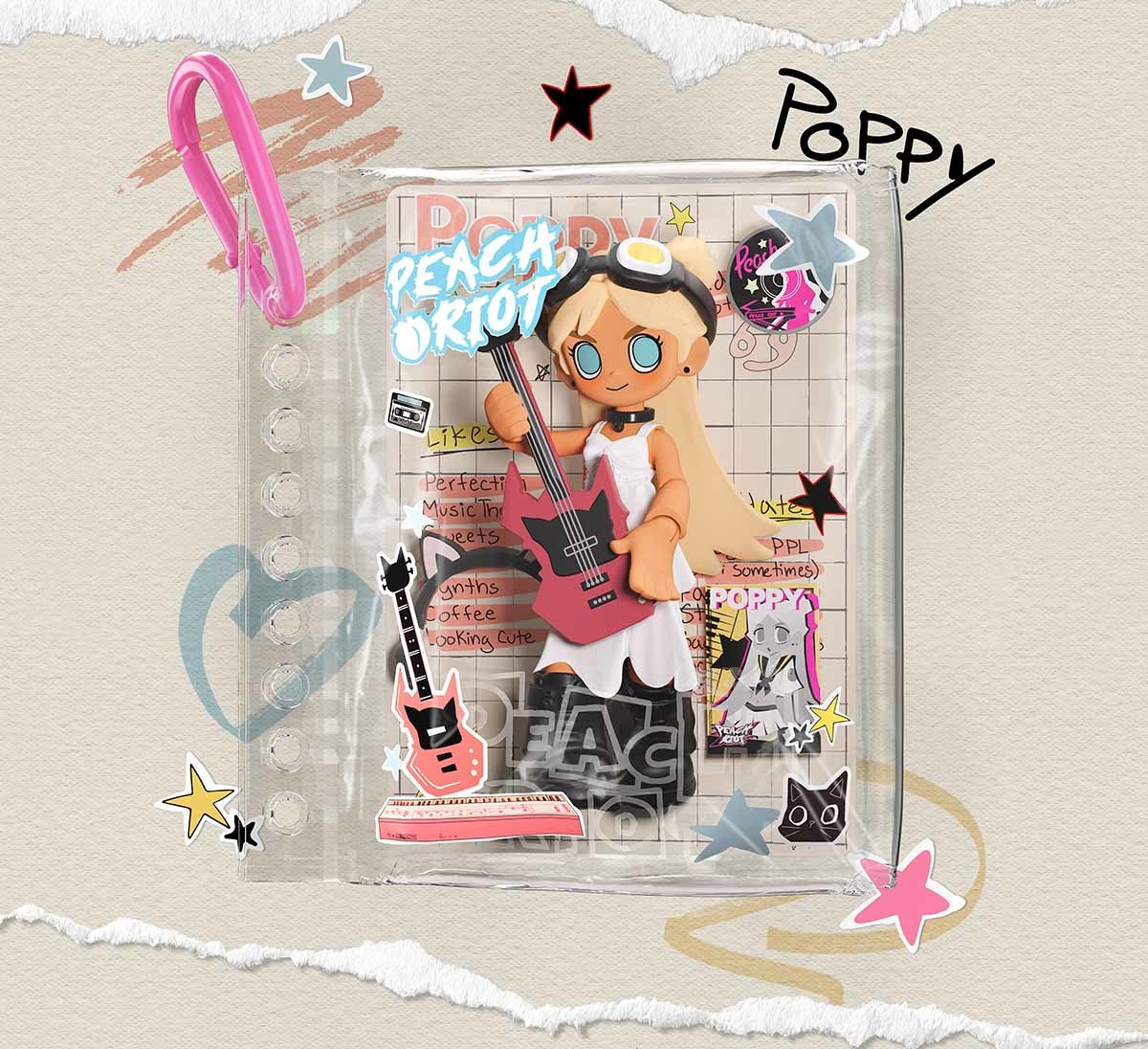 Peach Riot Carry the Music blind box series - Poppy Producer design example in its clear pendant pouch