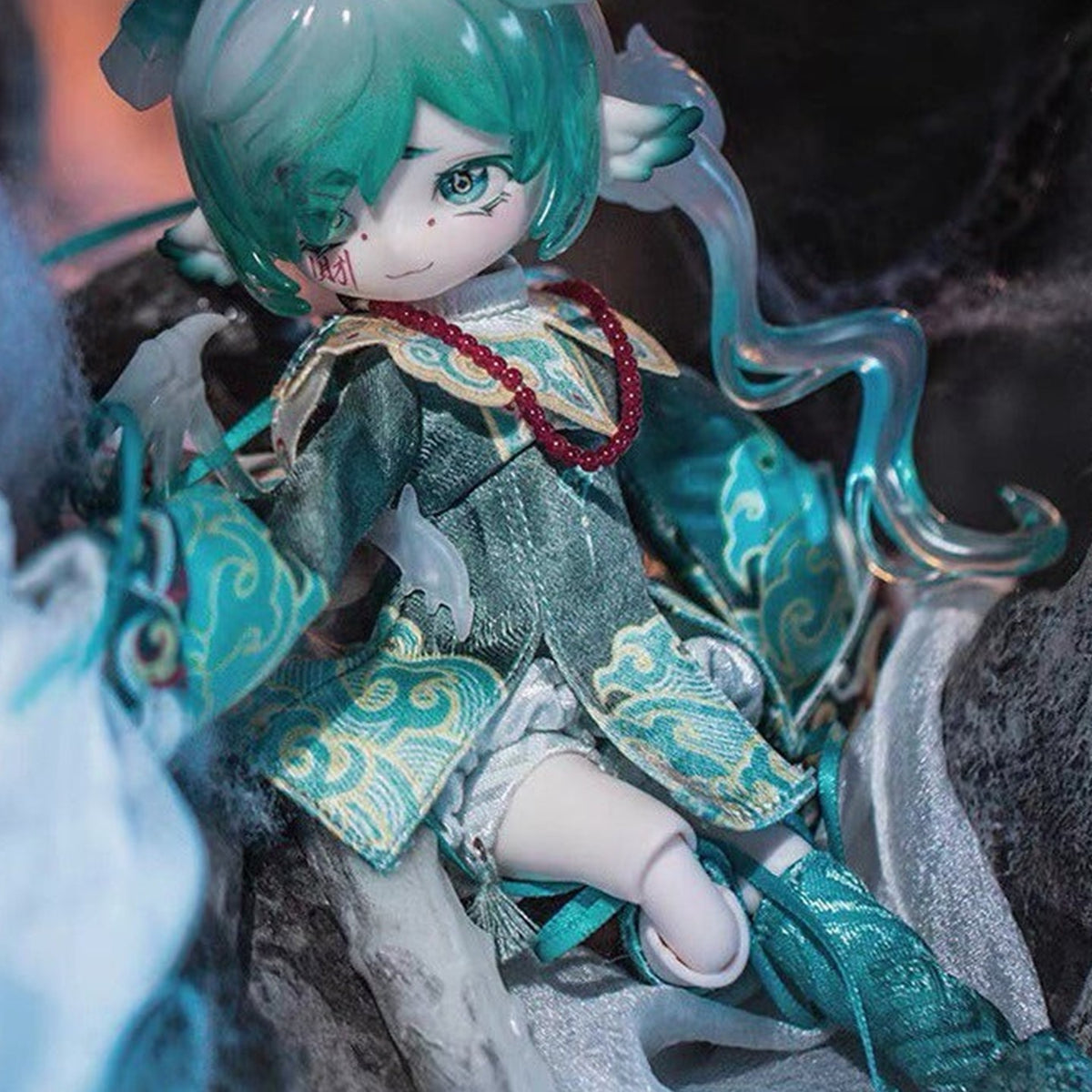 JIANG JIANG JIANG BJD doll — seated pose, mint hair and outfit details