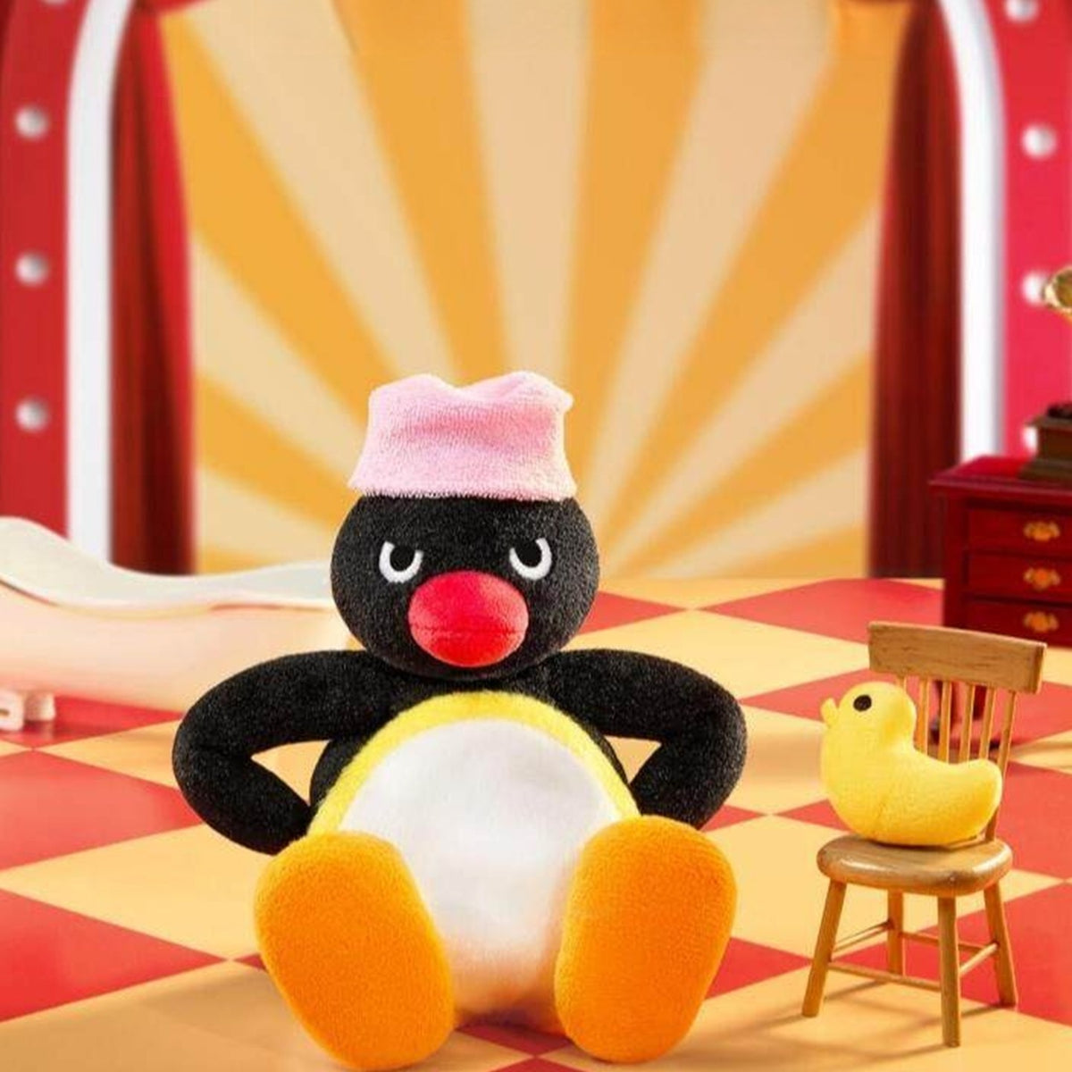 Pingu Little Theatre Series Plush Blind Box - Complete seated penguin plush example with pink cap; random design not guaranteed