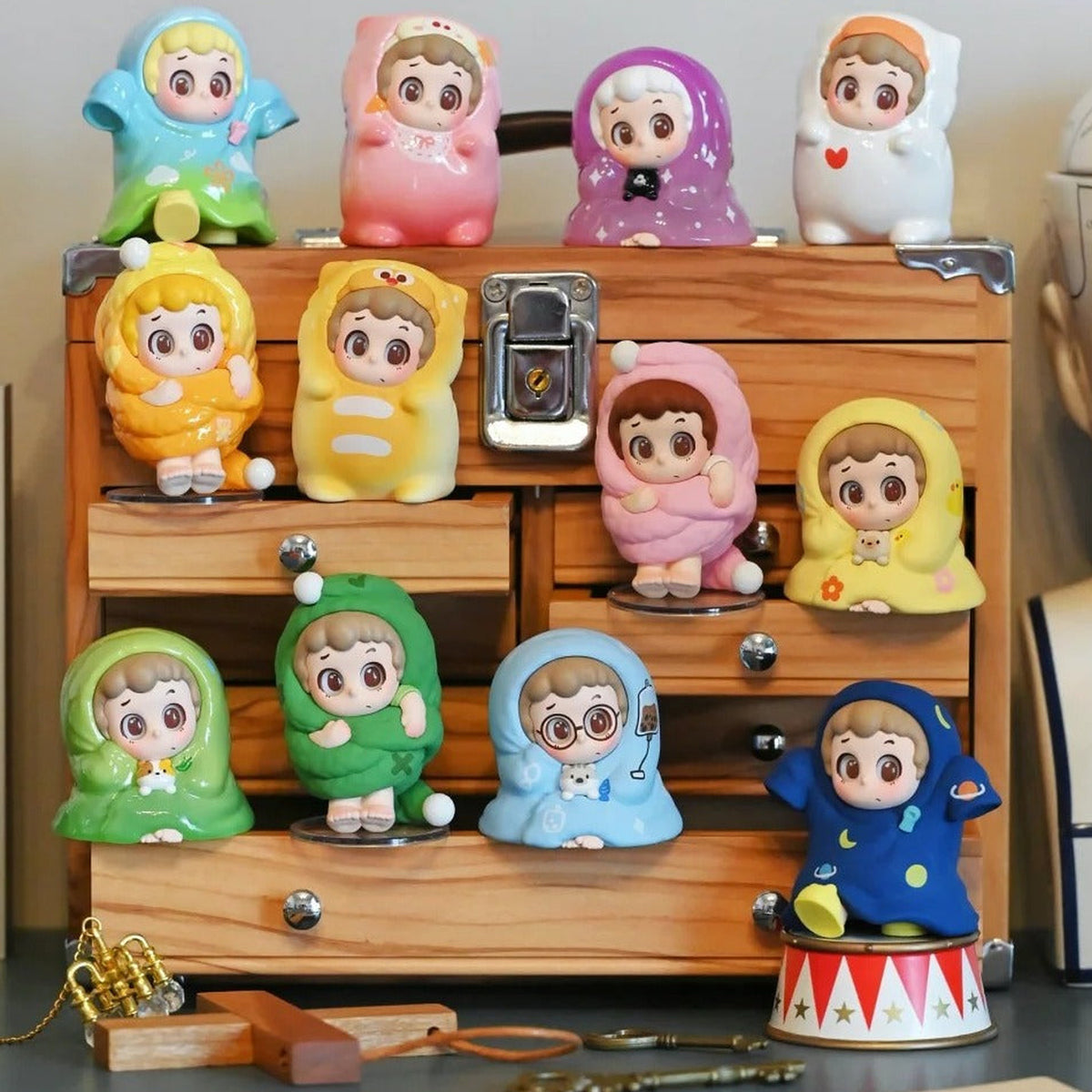 PINY Sleepover Series Mini Figures Blind Box - Series comparison with complete mini figures on cabinet display; random design not guaranteed