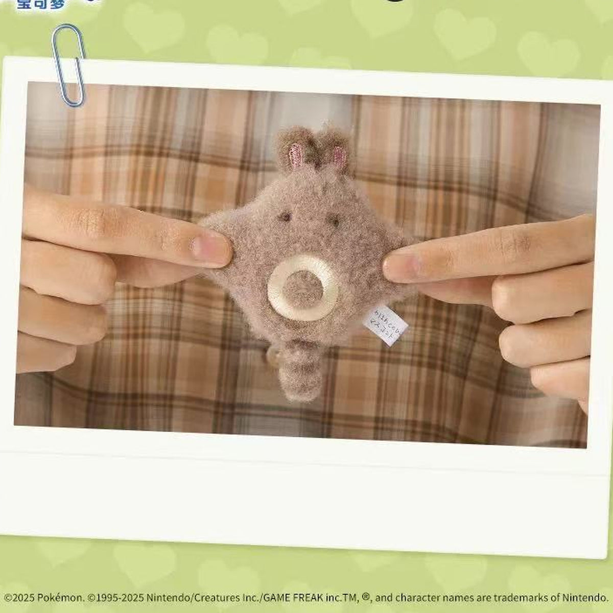 Pokémon Palm Fluffy Series Plush Pendant - Sentret plush detail held by hands; background display props not included; display props not included