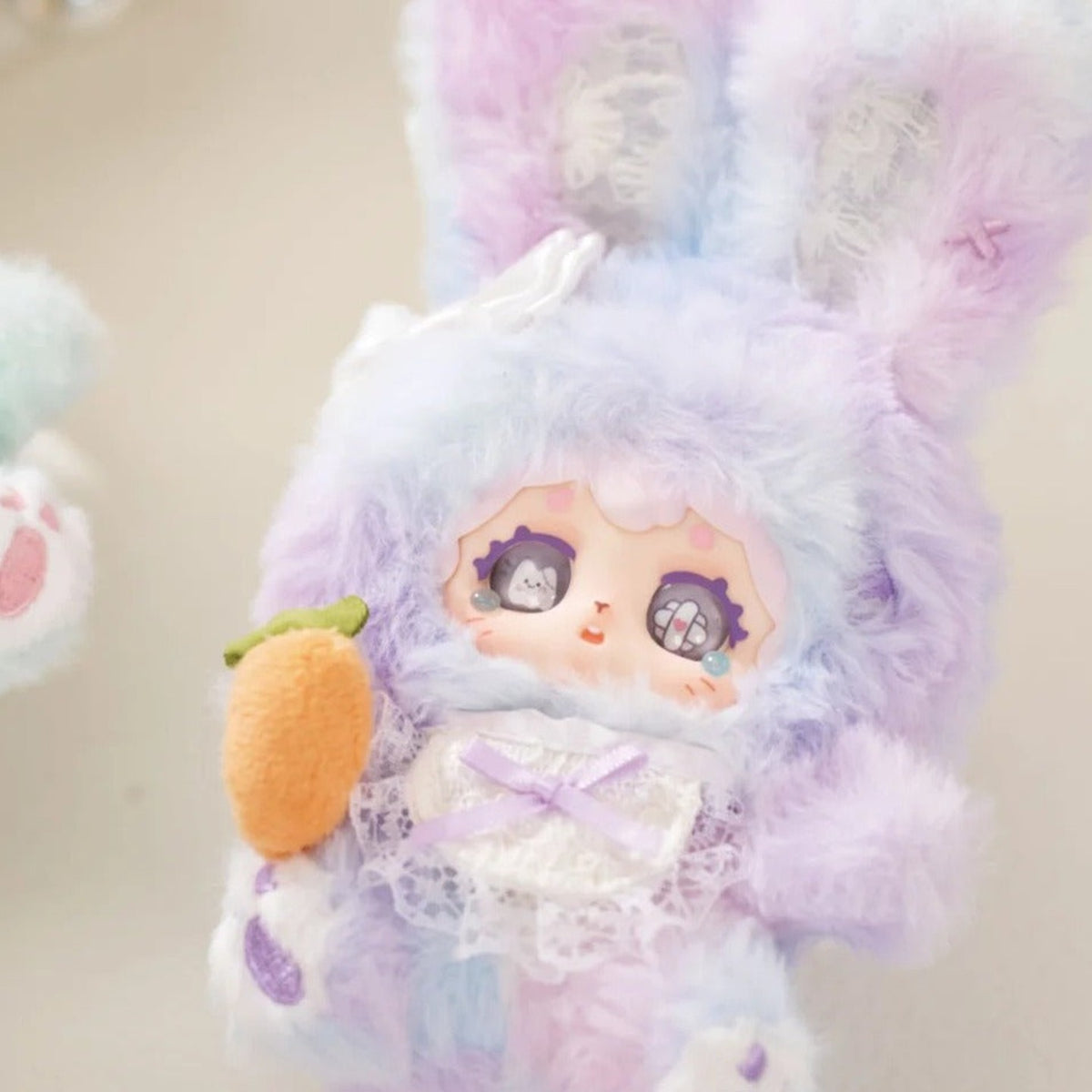 POKA Fluffy Collection: Purple rabbit-suit POKA plush design with carrot detail