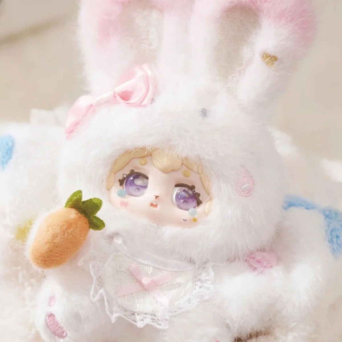 POKA Fluffy Collection: White rabbit-suit POKA plush design with pink bow and carrot detail