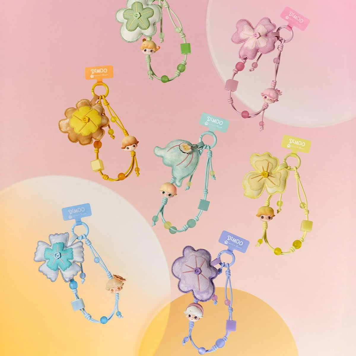 DIMOO Moments in Bloom decorative charms in varied flower colors; displayed designs are not guaranteed in a random box.