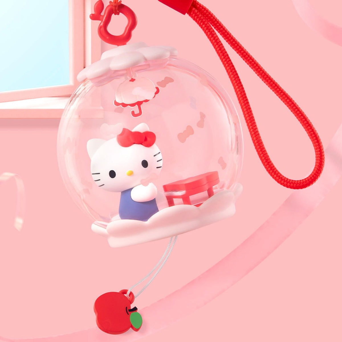 Hello Kitty Sweet Dream Bubble House design example with red cord and apple-shaped charm; random purchase, not a confirmed character