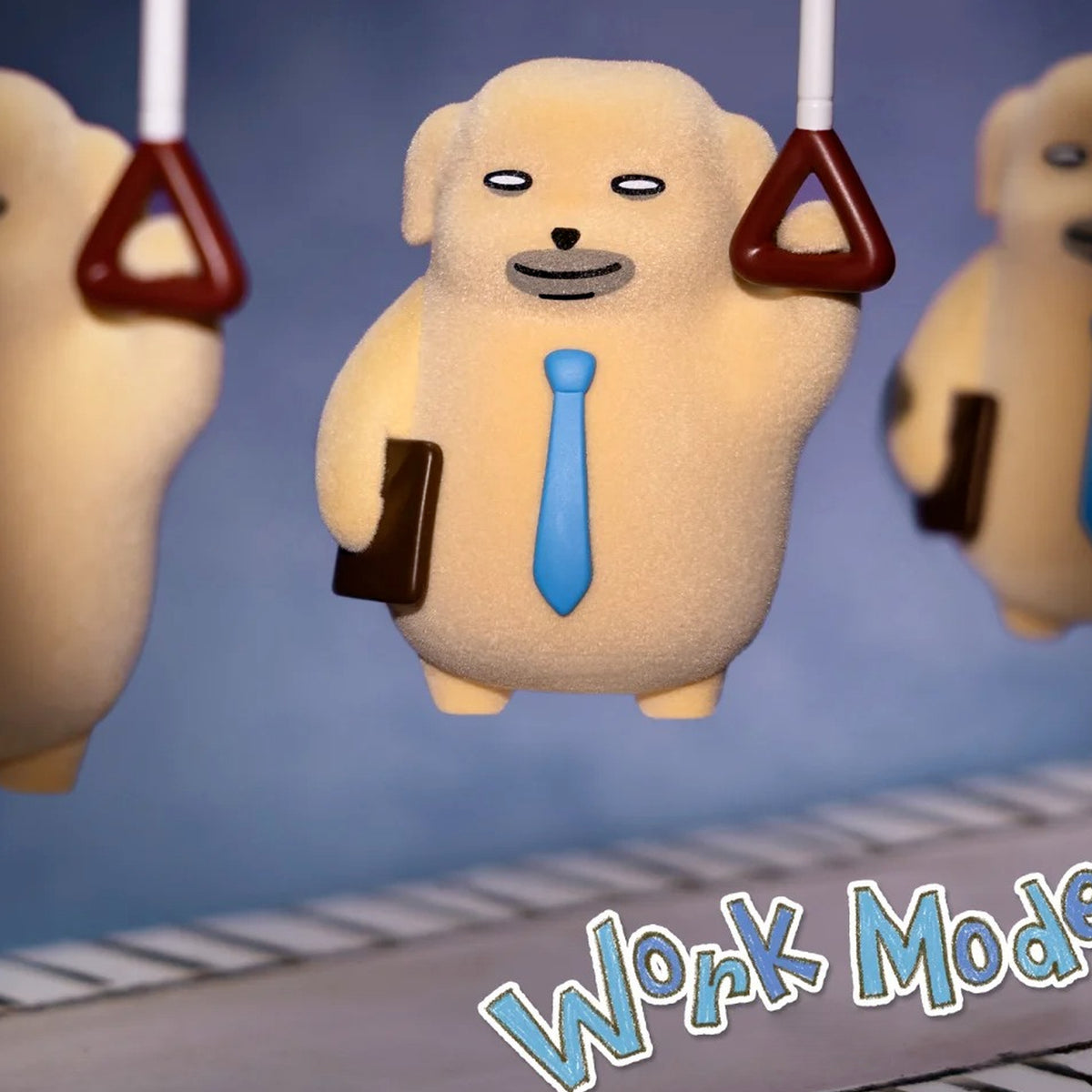 NUDAENG The Meh Work Mode design with a blue tie and brown book in a train-themed scene