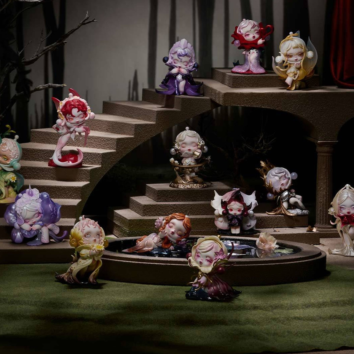 SKULLPANDA Petals in Four Acts figure assortment arranged on tiered display steps; pictured designs are examples, not one-box contents.