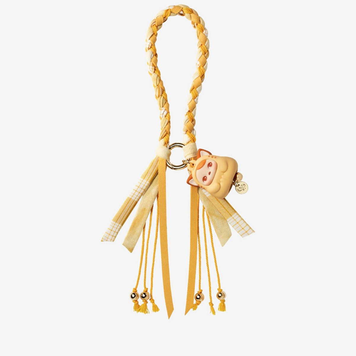 PUCKY Tap Tap Babies pendant blind box series - yellow pendant design example with braided loop and ribbon tassels on a white background