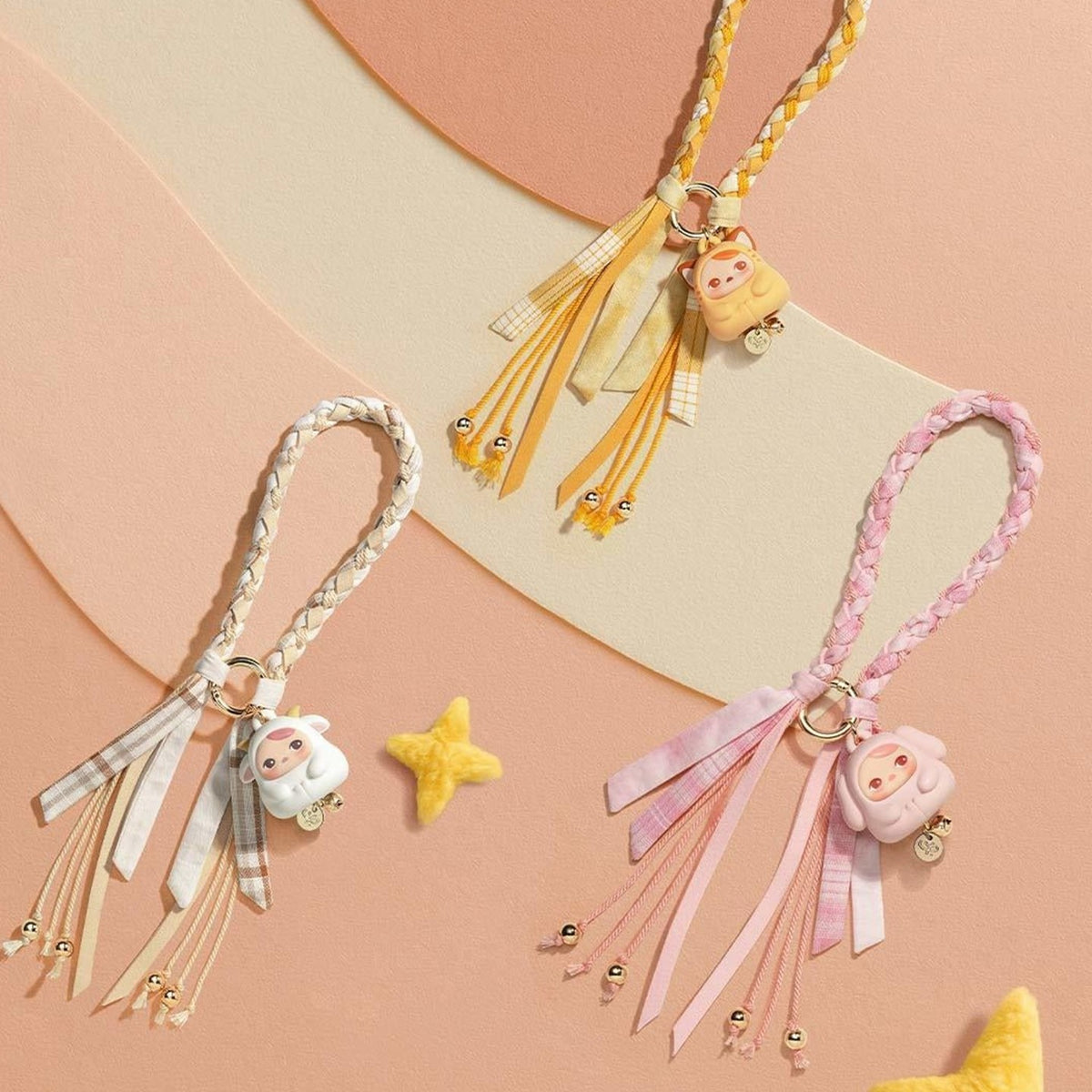 PUCKY Tap Tap Babies pendant blind box series - yellow, white and pink pendant design examples; random design not guaranteed