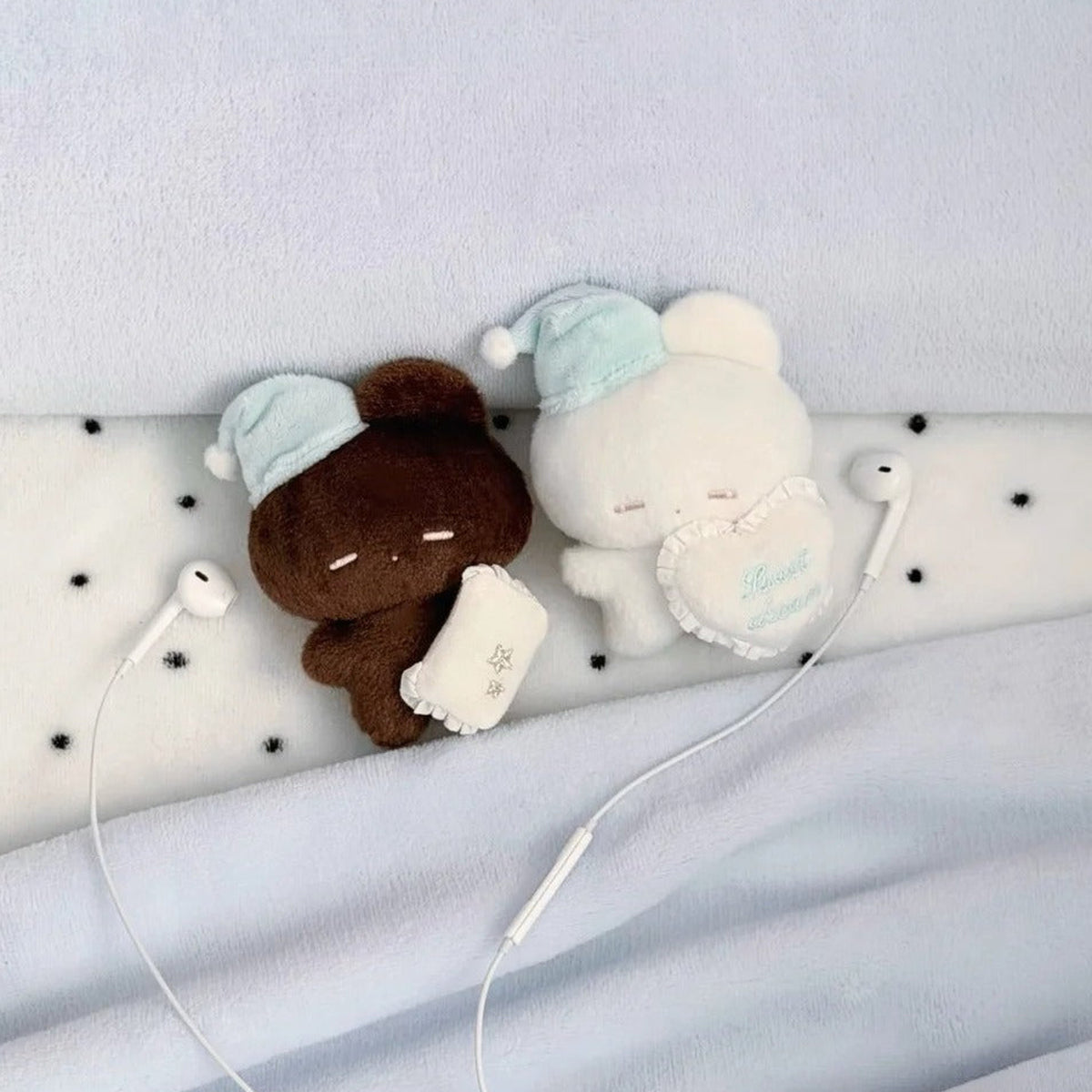 REMME Sweet Dream Series Plush Blind Box - Two sleep-themed plush doll examples with lower bodies under blanket; random design not guaranteed