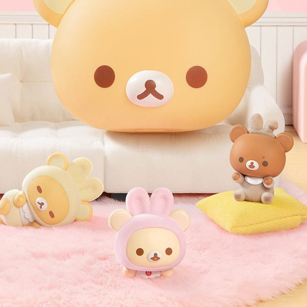 Rilakkuma Minna de Usausababy Series Figure Blind Box - Three complete small figure examples with a large background bear-head prop cropped; random design not guaranteed