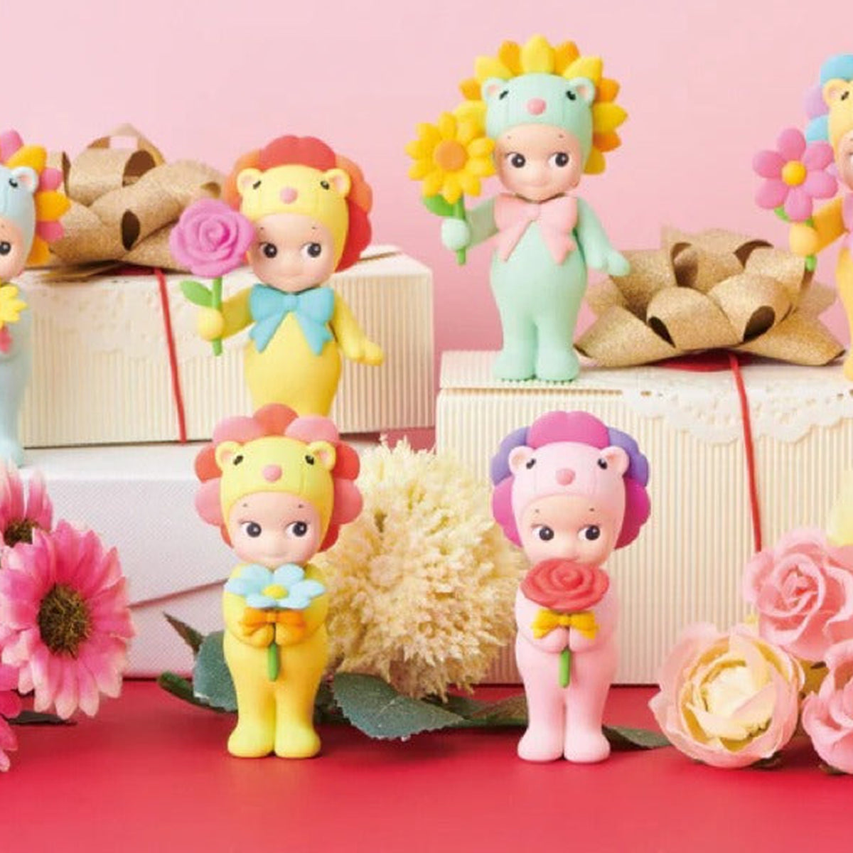 Sonny Angel Flower Gift: Flower Gift mini figures displayed beside decorative gift boxes