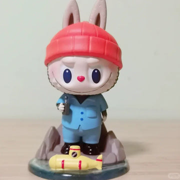 THE MONSTERS Labubu Explorer Figurine — 12cm Blister Pack - main product card | KikiBuddies
