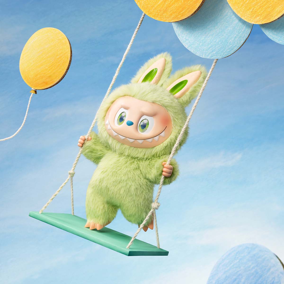 THE MONSTERS DANCE WITH WIND vinyl doll posed sitting on a swing; swing and scene props not included