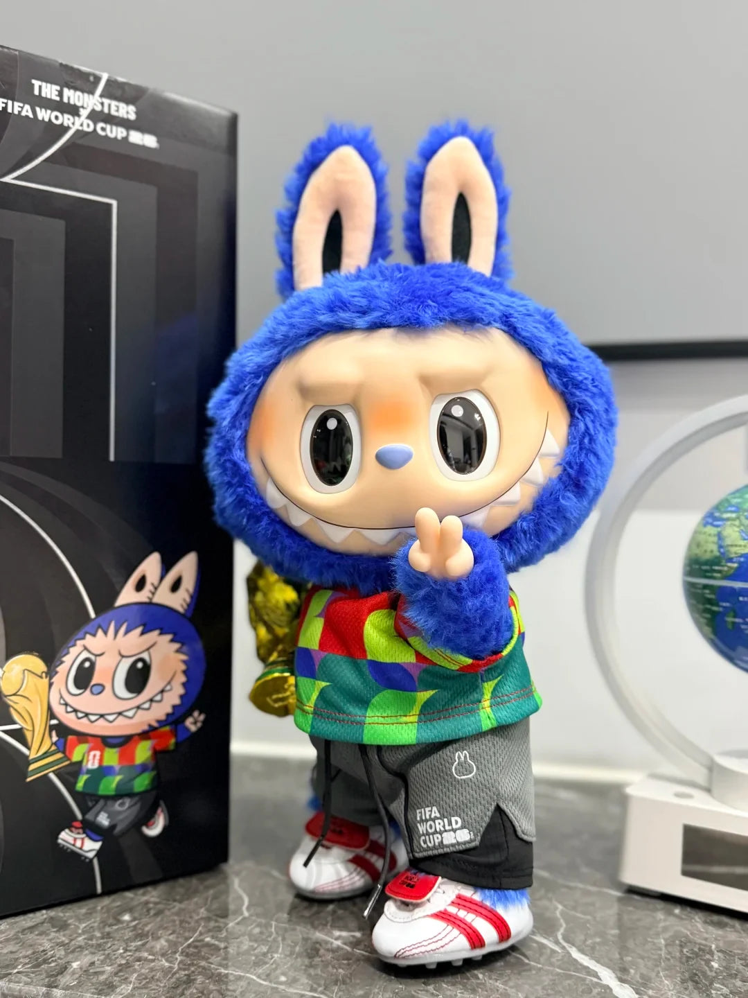 THE MONSTERS × FIFA SERIES-Catch the Win Vinyl Plush Doll 38cm - lifestyle scene | KikiBuddies