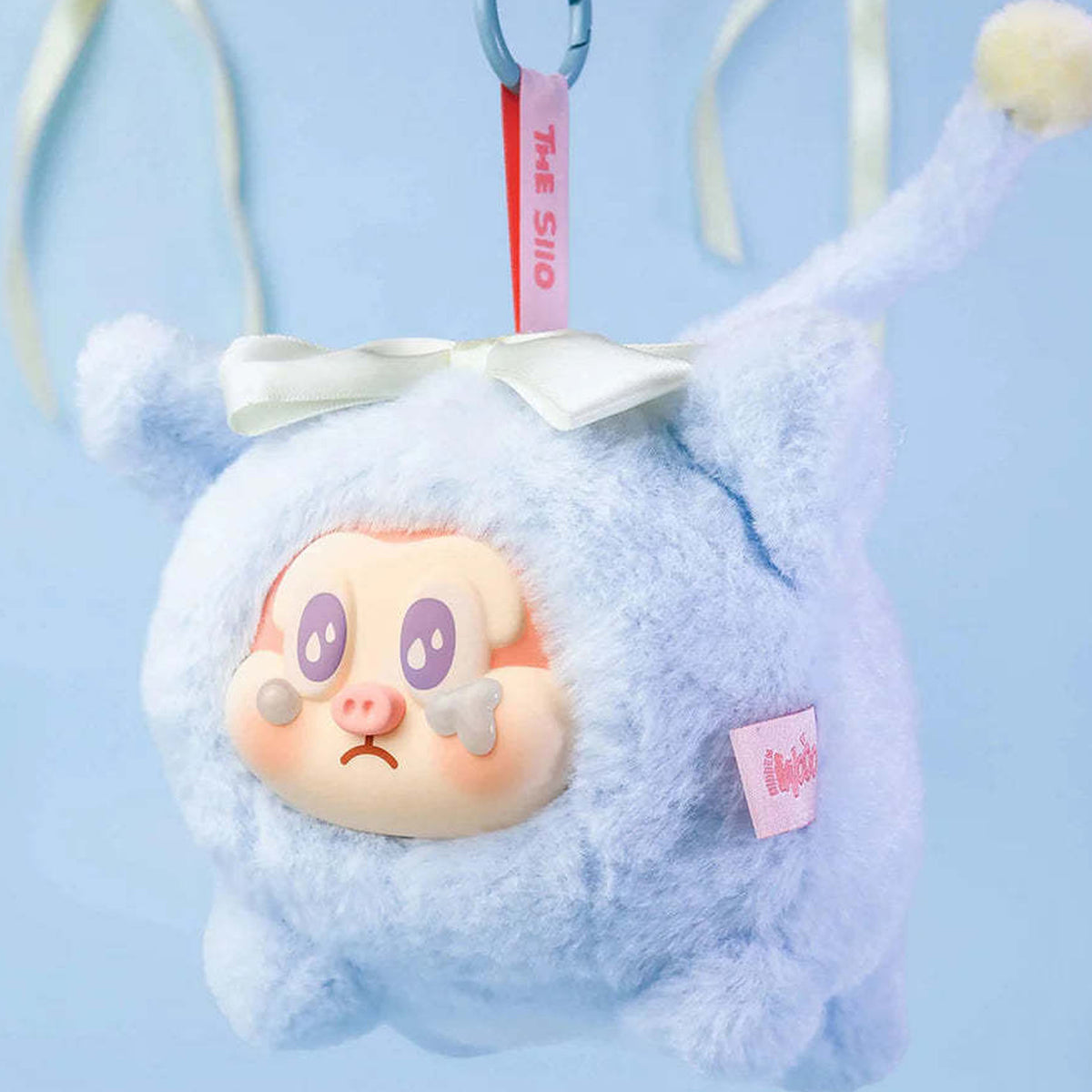 THE SLLO Flying Pig Series Plush Dolls, Blind Box - Blue plush pendant detail with upper ears and hanging ring cropped; random design not guaranteed