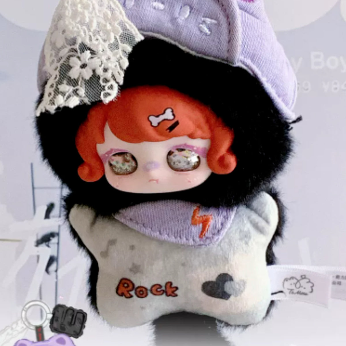 TOMEET Cuteness Accelerating Series Plush Pendant Blind Box - Dark plush design with orange hair, pale outfit and purple headwear; upper headwear cropped; random design not guaranteed; display props not included