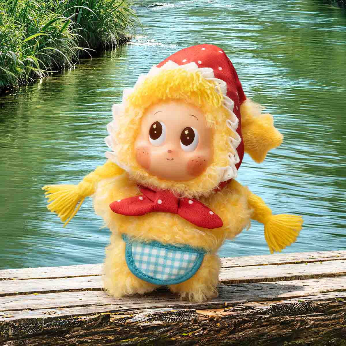 TWINKLE TWINKLE Farm Tales Fearless Pumpkin vinyl plush pendant in a farmyard display scene; scenery props are not included