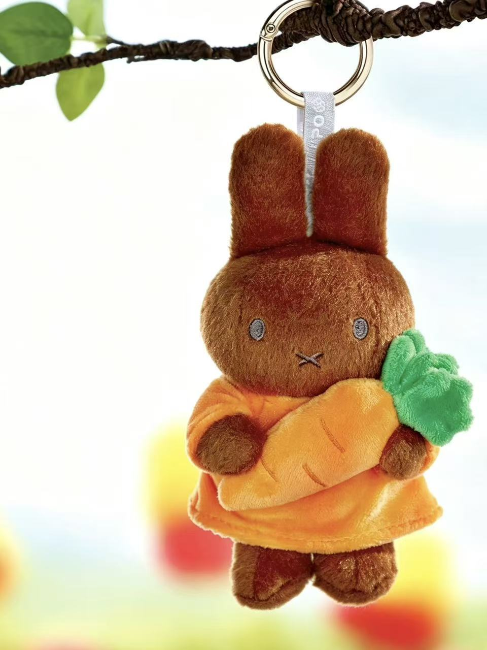 Boris Bear Hug carrot plush pendant hanging from its metal ring