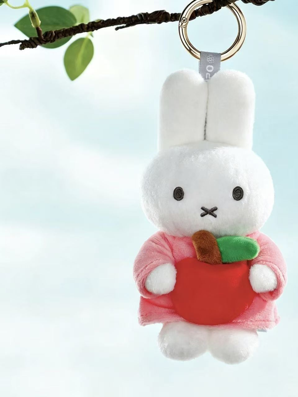 Miffy Hug apple plush pendant hanging from its metal ring