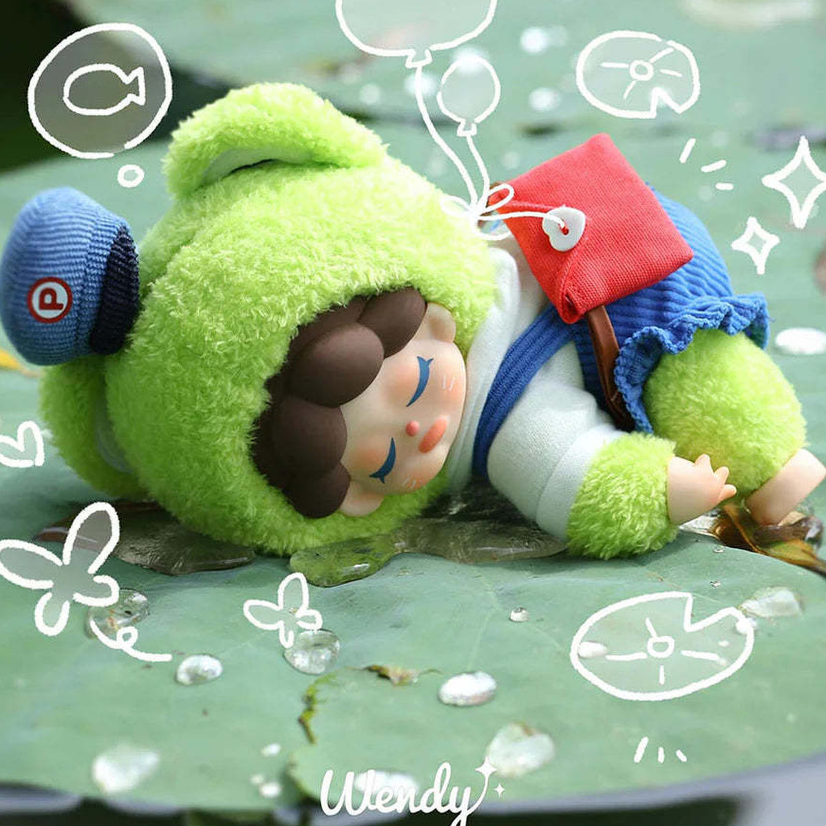 Wendy Garden Treasure Hunt Series Plush Dolls, Blind Box - Green plush in reclining pose with blue cap and red pouch; outer foot cropped; random design not guaranteed; display props not included