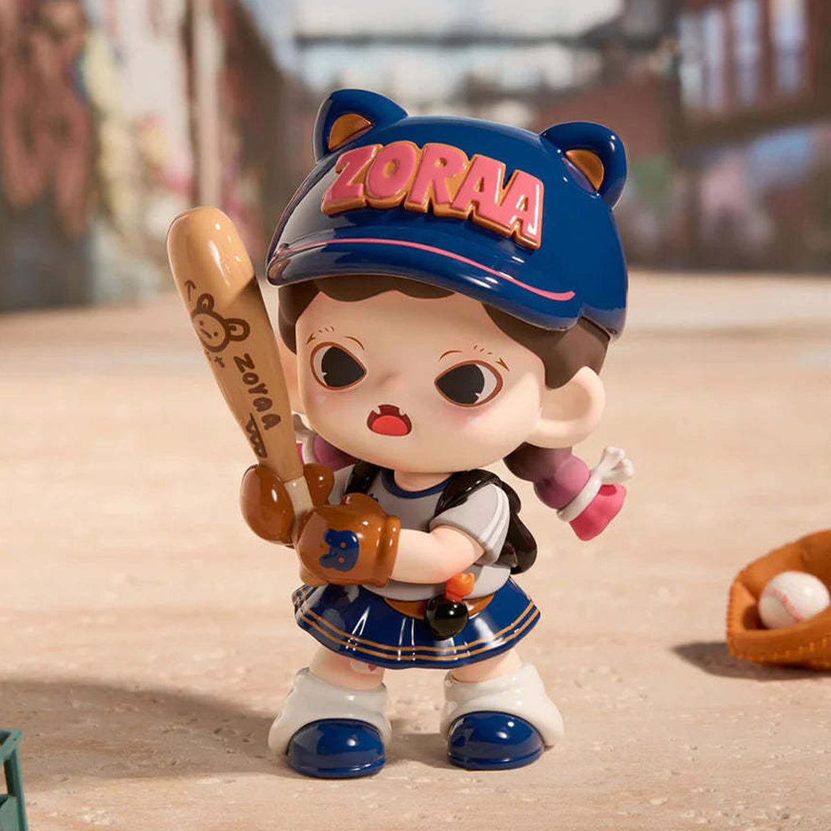 Zoraa I'm the Boss Figure baseball design example with a blue cap and bat; random design is not selectable