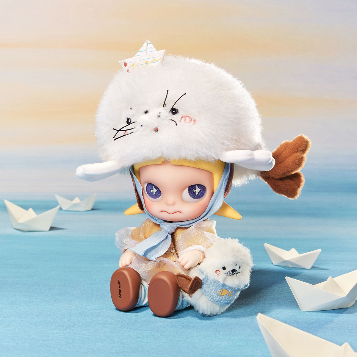 Zsiga Right on Time action figure seated with patterned eye plates; paper boats are display props